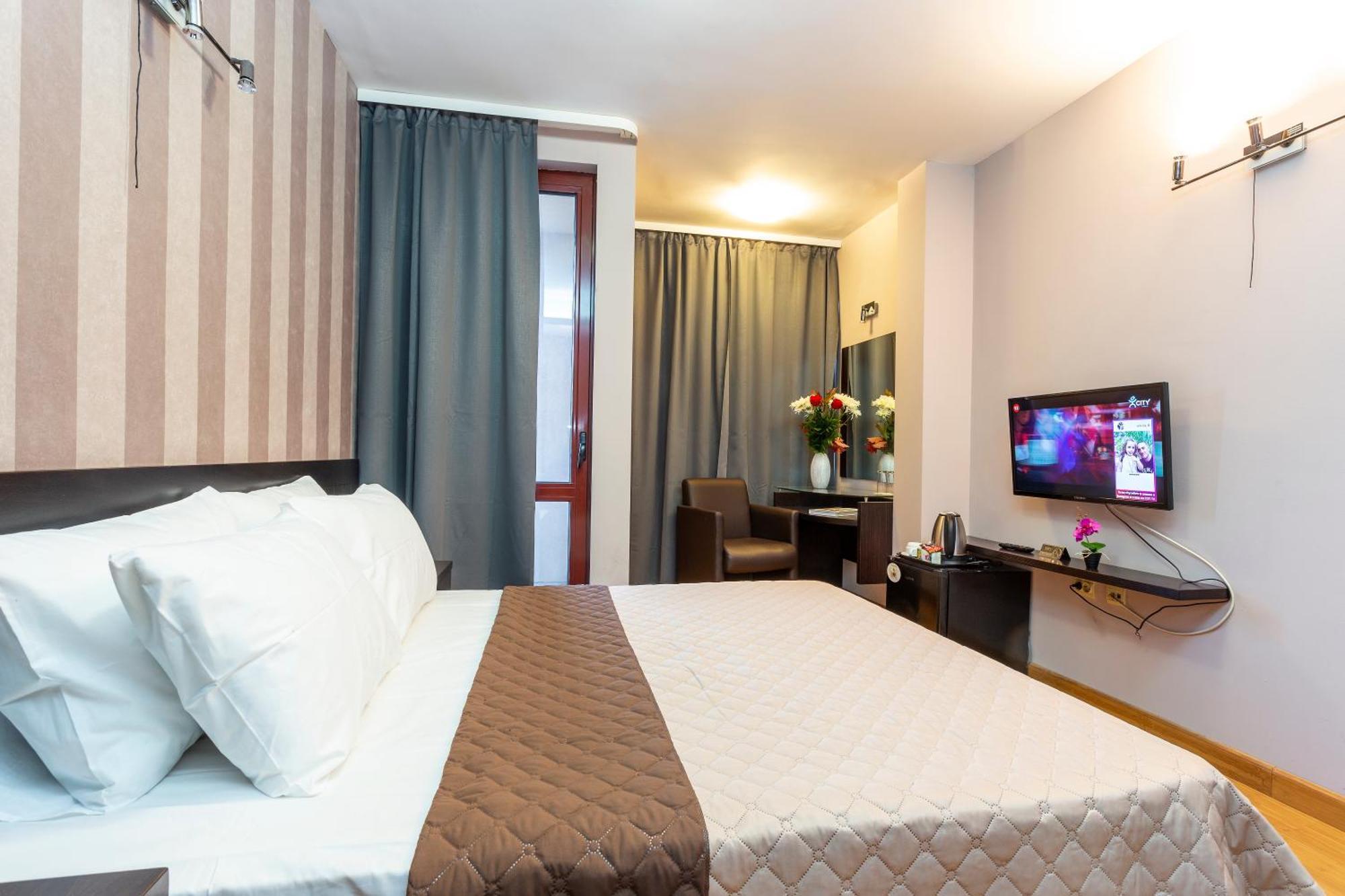 Cityhome Aparthotel — Photos 2